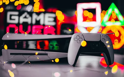 Gaming console and tech gadgets arranged as Father's Day gift ideas